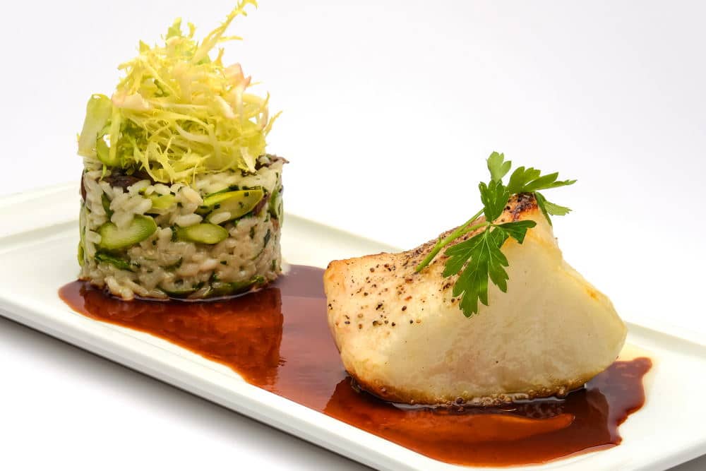 Food Photography of an elegant Halibut plate