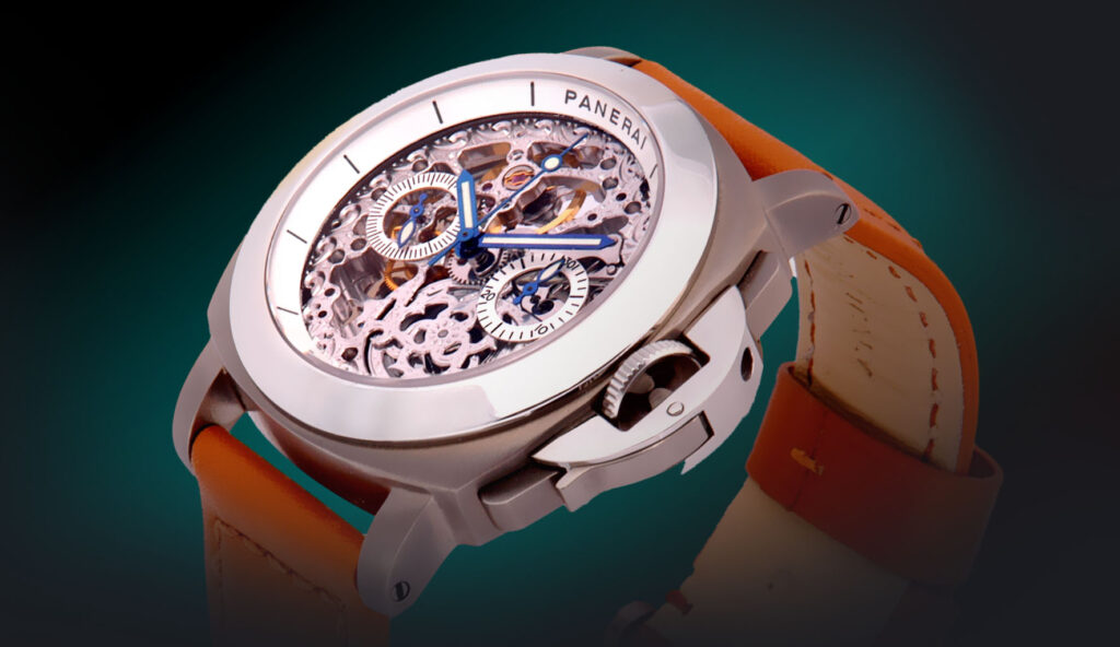 Panerai Luminor skeletonized tourbillon GMT watch showing an openwork dial and orange strap against a teal background